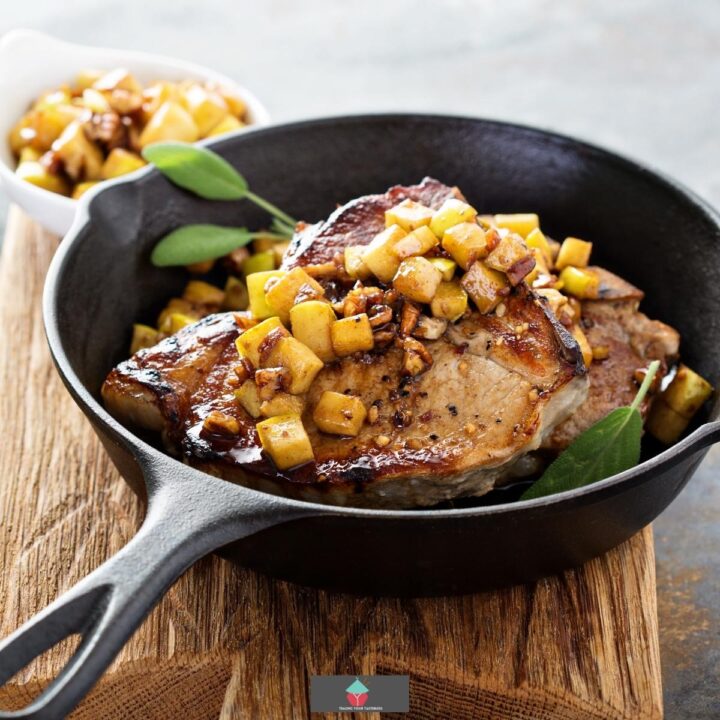 Apple Cider Pork Chops, pan fried, juicy tender pork chops cooked with fresh herbs, apples and apple cider. An easy dinner recipe full of flavor