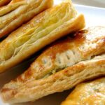 Nanny Chan's Mild Curry Puffs with a delicous mild spiced filling of ground meat wrapped in a flaky pastry. Great as a snack, appetizer or party food! 