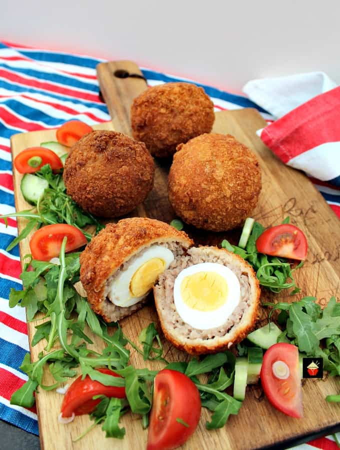 The Best Homemade Scotch Eggs, a popular British snack, perfect for a picnic, breakfast, or any occasion. Delicious eggs wrapped in sausage meat and coated in crispy breadcrumbs. The Best Homemade Scotch Eggs, a popular British snack, perfect for a picnic, breakfast, or any occasion. Delicious eggs wrapped in sausage meat and coated in crispy breadcrumbs.