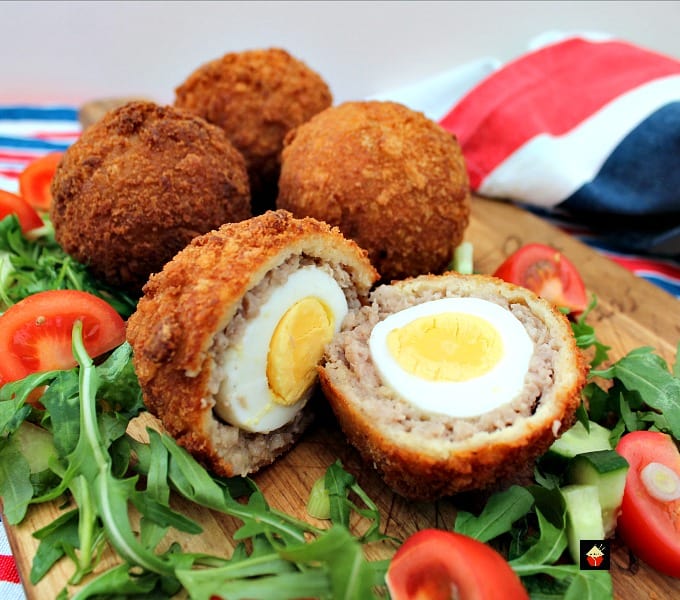 The Best Homemade Scotch Eggs, a popular British snack, perfect for a picnic, breakfast, or any occasion. Delicious eggs wrapped in sausage meat and coated in crispy breadcrumbs. The Best Homemade Scotch Eggs, a popular British snack, perfect for a picnic, breakfast, or any occasion. Delicious eggs wrapped in sausage meat and coated in crispy breadcrumbs.