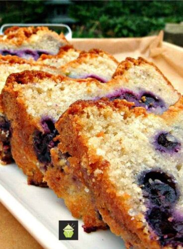 Blueberry Lemon Pound Cake, a delicious soft and moist loaf bursting with juicy blueberries! Perfect with a cup of tea