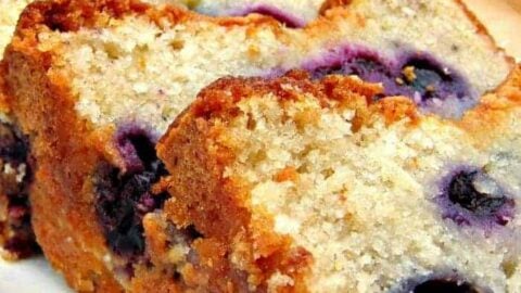 Blueberry Lemon Pound Cake, a delicious soft and moist loaf bursting with juicy blueberries! Perfect with a cup of tea