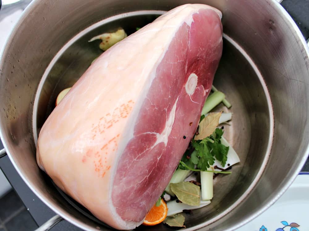 Honey Glazed Ham. Showing ham in the pan with the brith ingredients Honey Glazed Ham. Showing ham in the pan with the brith ingredients