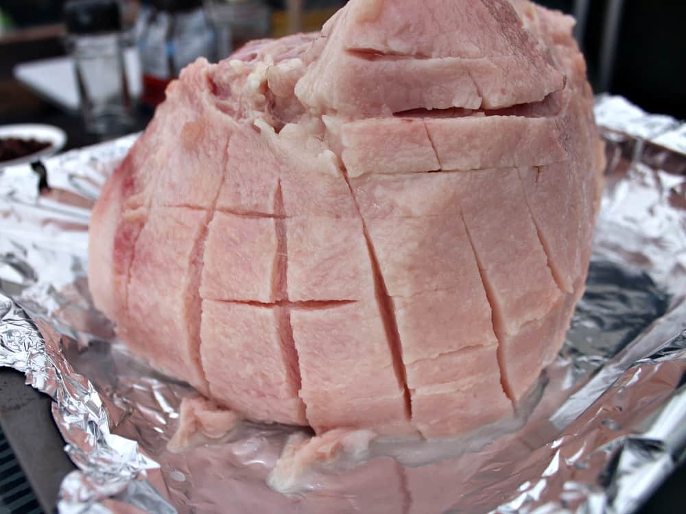 Honey Glazed Ham. Showing how to score the fat on the ham Honey Glazed Ham. Showing how to score the fat on the ham