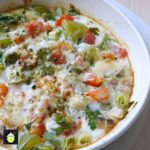 Easy Bake Brunch, a deliciously simple recipe with baked eggs, bacon, cheese and peppers. Great for a weekend!