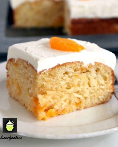 Mandarin Cake. A delicious soft cake with juicy mandarins running throughout , topped with fresh whipped cream. A perfect cake for an English Afternoon Tea