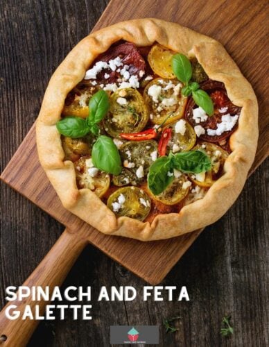 Spinach and Feta Galette, a delicious open pastry savoury pie filled with Greek feta cheese creamy spinach and tomatoes, then baked until set. Great served warm or chilled.