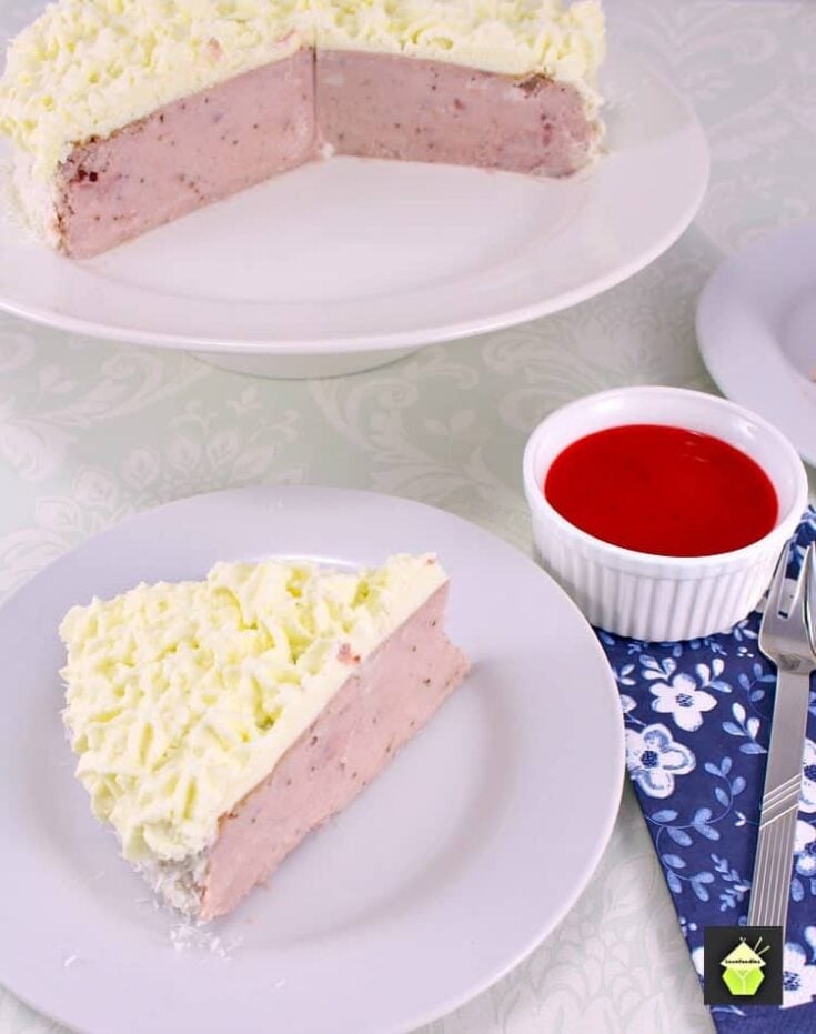 Strawberry and Coconut Ricotta Cheesecake. A delicious fluffy, creamy baked cheesecake with fresh strawberries and coconut in the filling and topped with a fresh strawberry puree. Very easy recipe too!