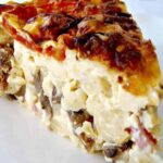 The Naked Quiche is a full breakfast, brunch or supper time dish, loaded with mac n cheese, baby meatballs and bacon, comfort food at it's best!