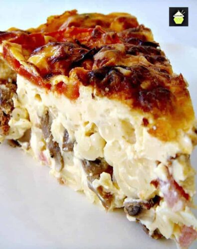 This Celebration Breakfast Casserole is a full breakfast, brunch or supper time dish, loaded with mac n cheese, baby meatballs and bacon, comfort food at its best!