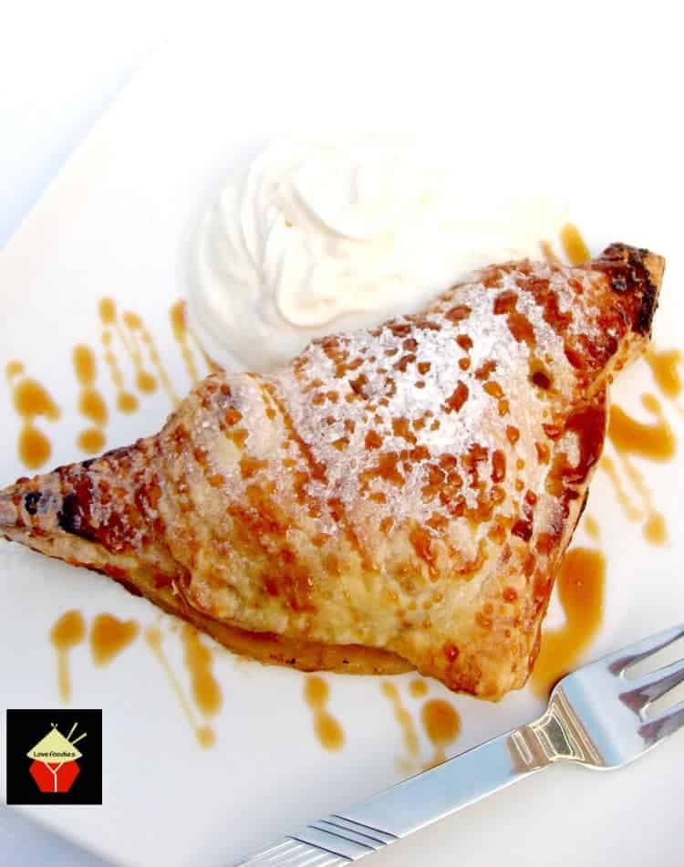Easy Apple Spiced Turnovers 2 EASY APPLE SPICED TURNOVERS.. Delicious warm from the oven! Crispy puff pastry packed with apples coated in cinnamon. Delicious eaten warm or chilled with a blob of ice cream too! Easy recipe, budget friendly and freezable.