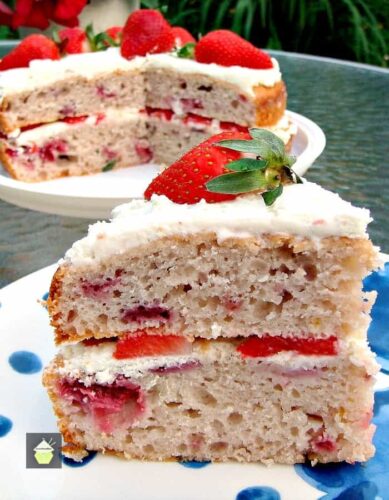 Strawberry Yogurt Cake - This cake is light, fluffy and BURSTING with strawberry flavor! Made from scratch and using fresh ingredients. Easy recipe too. Yummy!