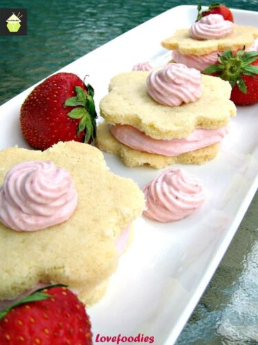 Strawberry Mousse Shortbread. Creamy, fluffy mousse sandwiched between two wonderful Shortbread cookies!