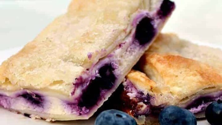 Blueberry Crescent Roll Cheesecake Bars. An incredibly easy recipe with cream cheese and blueberry filling sandwiched between layers of pastry. This tastes amazing!