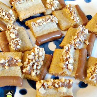 Peanut Butter and Cashew Butter Cookies. I've used Peanut Butter, melted chocolate and chopped cashew nuts for decoration. It's certainly a family favorite so please enjoy!