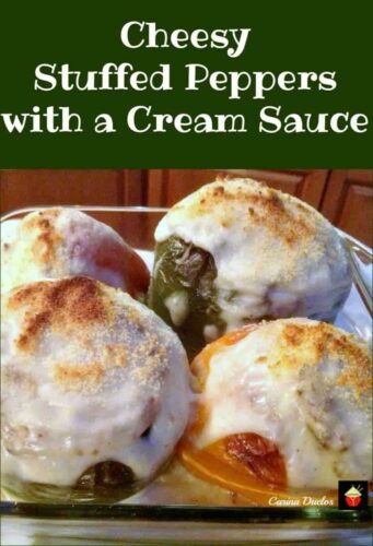Cheesy Stuffed Peppers with a Cream Sauce, peppers filled with a lovely cream cheese mixture and topped off with a lovely cream sauce and baked. Good as a main or side dish.