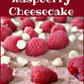 Chocolate Raspberry Cheesecake. This is a lovely No Bake dessert with raspberries filled (yes filled!) with white chocolate drops and also throughout the filling. the combination is so yummy! Easy recipe and great for making ahead too!