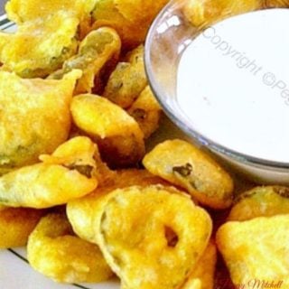 Crispy Fried Pickled Dills - All you have to decide is what your favorite dipping sauce would be! These are light and crispy and of course, absolutely delicious! Always popular with a crowd.