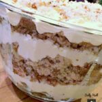 Italian Cream Cake Trifle, this is the most amazing trifle! Layers of classic fluffy Italian Cream Cake combined with delicious layers of creamy pudding, pecans and coconut will bring smiles to everyone who eats this! #Italian #Trifle #Christmas #Thanksgiving #