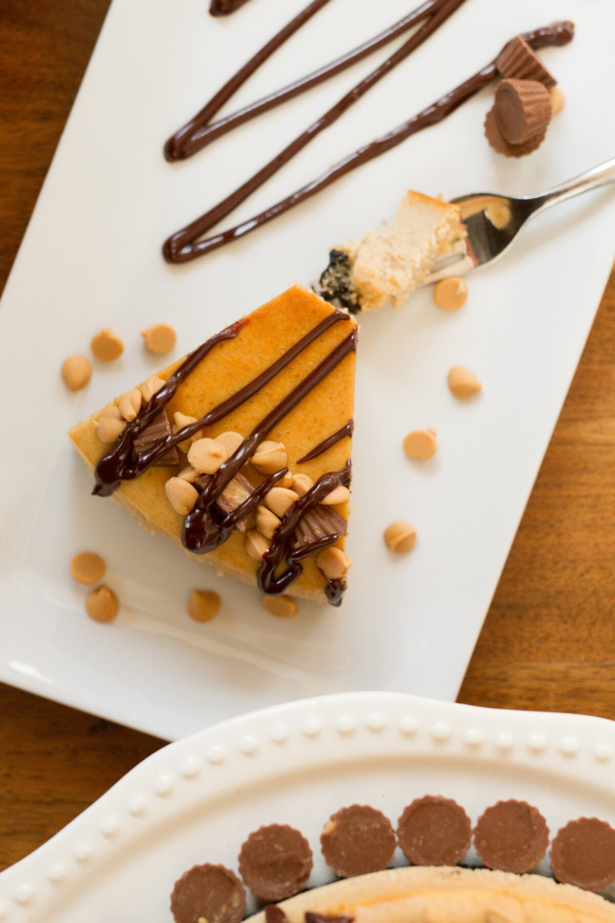 Peanut Butter Brownie Cheesecake 7 Peanut Butter Brownie Cheesecake, a popular baked cheesecake with a brownie base and peanut butter filling. Perfect for chocolate lovers and great for parties and celebrations.