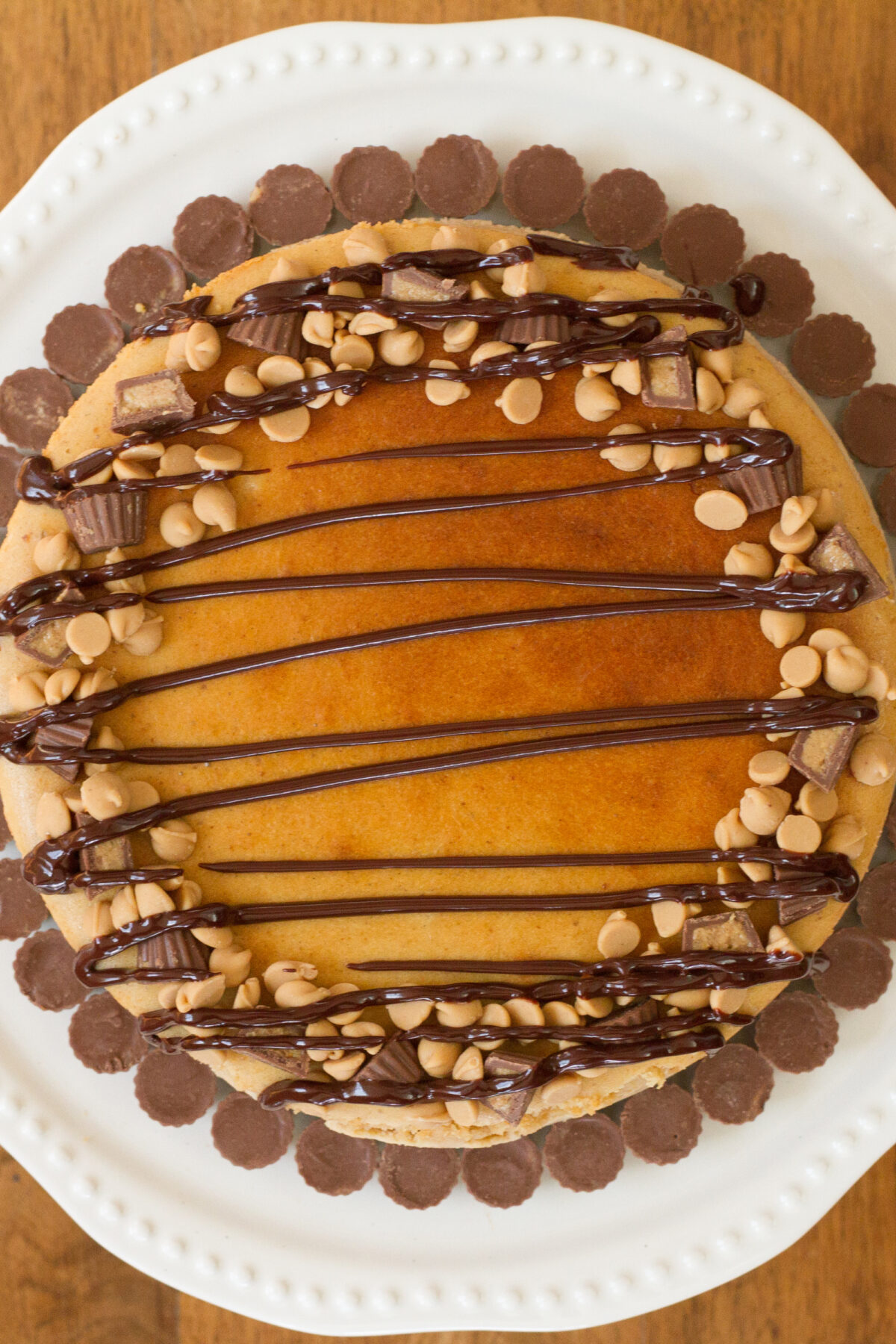 Peanut Butter Brownie Cheesecake 9 Peanut Butter Brownie Cheesecake, a popular baked cheesecake with a brownie base and peanut butter filling. Perfect for chocolate lovers and great for parties and celebrations.
