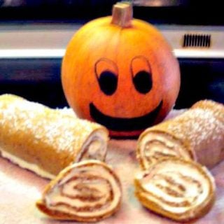 Pumpkin Roll Cake. A fun and easy recipe, and also instructions on how to make your own pumpkin puree.
