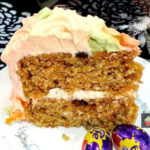 Celebration Carrot Cake, a beautifully moist and soft carrot cake with the surprise addition of coconut and a whipped cream frosting make this cake absolutely delicious!