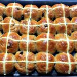 Hot Cross Buns are a lovely soft, spiced sweet roll, and traditionally made at Easter time, simply spilt apart and spread with butter and jam. They're lovely eaten warm from the oven or split and toasted. Nowadays, these are enjoyed all year round! Very easy to make and freezer friendly.