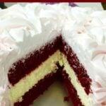 RED VELVET CAKE CHEESECAKE. It's a BIG WOW! Lovely vanilla cheesecake sandwiched between soft red velvet cakes and then topped with a light, fluffy puffy whipped cream frosting. It really is a WOW!