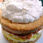 Coconut Cloud Layer Cake 19 Coconut Cloud Layer Cake. Layers of cake, meringue,macaroons, lemon, dulce de leche and coconut makes this cake fit for a celebration that's for sure! This does take some work, but for a special occasion and if you're looking for something a little different from your average celebration cake, this is the one which will turn heads!