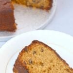 Caribbean Rum Cake. This is a super easy recipe and perfect with a cup of tea to celebrate the holidays! The cake is soft and moist, packed with rum infused raisins and makes for a great Christmas time cake. | Lovefoodies.com