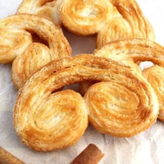 Easy French Palmier Cookies. These are a very easy crispy cookie, made up of simply 3 ingredients. Quick to make and very flexible with flavors. Suggestions for sweet and savory in the recipe for you! | Lovefoodies.com