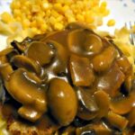 Jagerschnitzel! This is a lovely easy recipe for Pork pan fried in butter then topped with a delicious mushroom sauce. Very popular In parts of Germany and often served with Spaetzle or pasta. | Lovefoodies.com