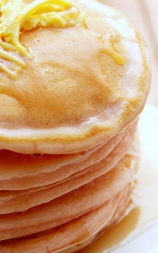 Perfectly Fluffy Pancakes. As fluffy as a feather! Quick and Easy to make, low in fat and perfect for a breakfast or dessert! | Lovefoodies.com