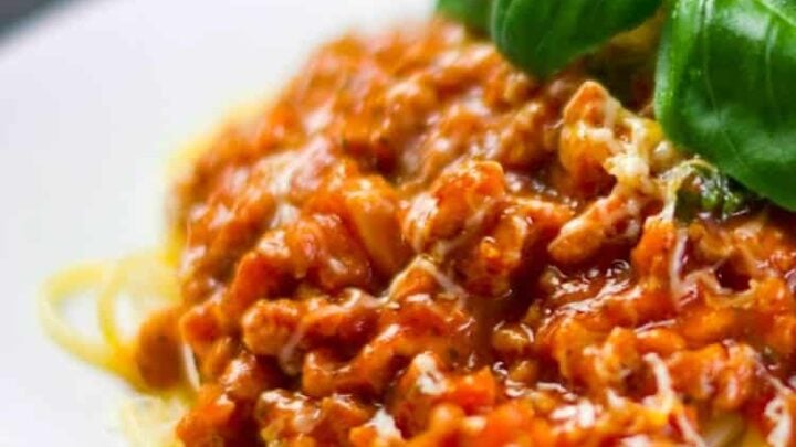 Slow Cooker Pasta Sauce?with fresh herbs, tomatoes and Italian Sausage. Delicious homemade goodness and freezer friendly too!