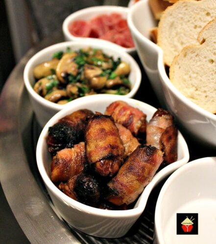 Bacon Wrapped Dates. These make for wonderful party food or part of a Tapas meal and incredibly easy to make. the sweet and salty flavor combination is so delicious! | Lovefoodies.com