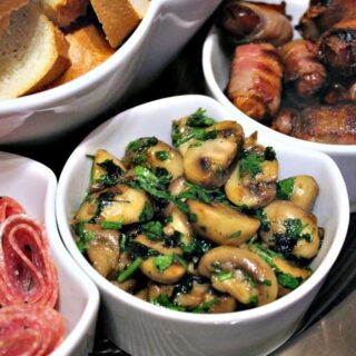 Spanish Garlic Mushrooms is a wonderful Tapas dish, often served as party food. Easy and quick to make and fantastic flavors. Also great as a side dish! | Lovefoodies.com