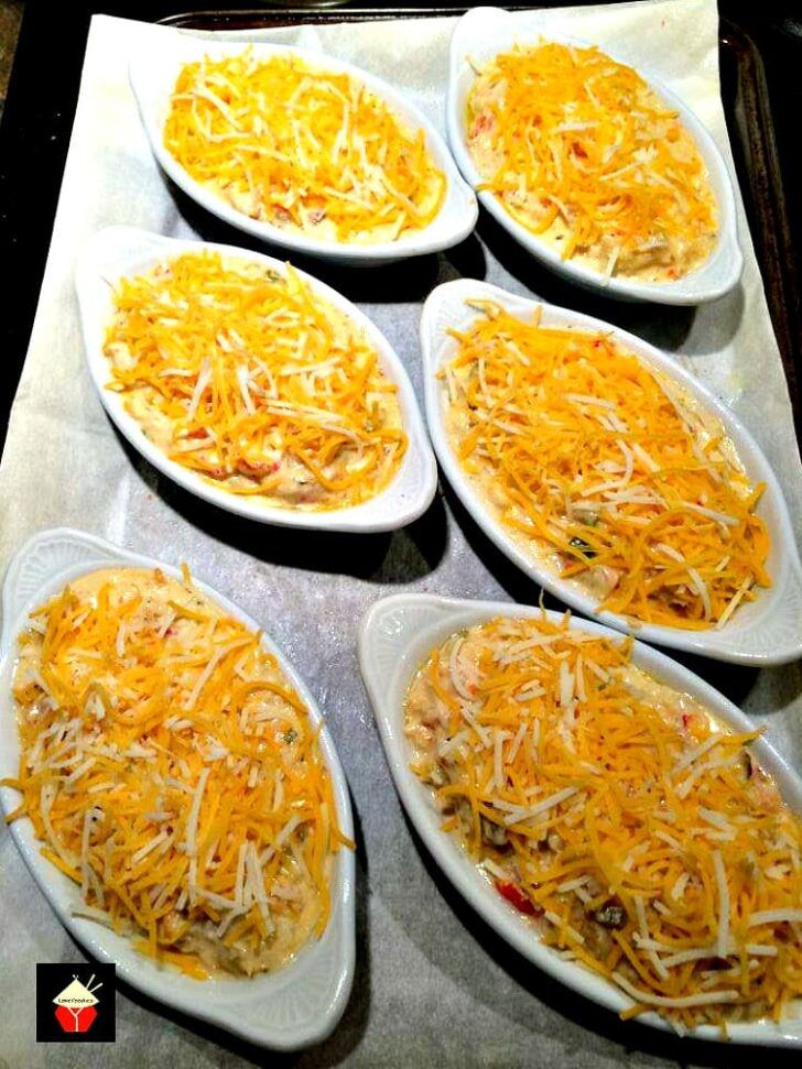 Cajun Crabmeat Au Gratin 5 Cajun Crabmeat Au Gratin. A truly delicious recipe full of fantastic flavors. Options to add shrimp or crawfish too! Delicious served as an appetizer or main meal. | Lovefoodies.com