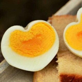How to Make Heart Shaped Eggs, a great tutorial for shaping hard boiled eggs into heart shapes. Great for a Valentine's Day breakfast!