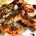 Zingy Lemon Butter Chicken Wings. These are lovely chicken wings with a zingy zangy flavor. Easy recipe, baked and oh so good! | Lovefoodies.com