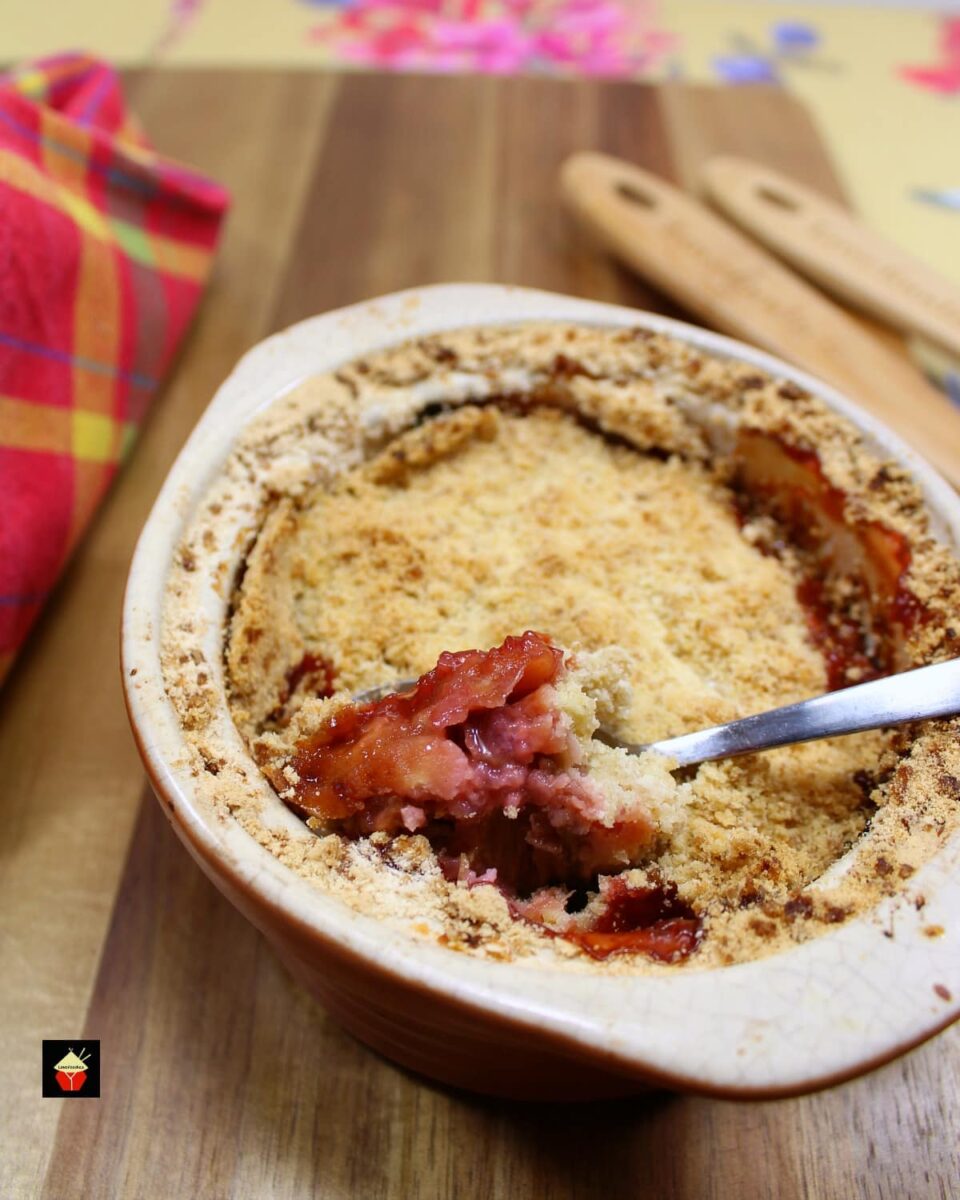 Best Ever Rhubarb Crumble. A delicious easy dessert with juicy sweet and tangy rhubarb and a crisp, crunchy topping. A perfect pudding made from scratch.