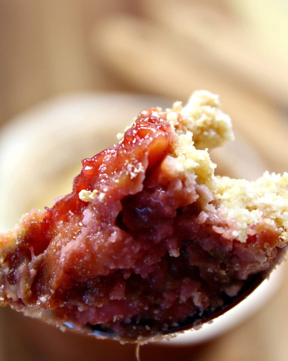 Best Ever Rhubarb Crumble. A delicious easy dessert with juicy sweet and tangy rhubarb and a crisp, crunchy topping. A perfect pudding made from scratch.