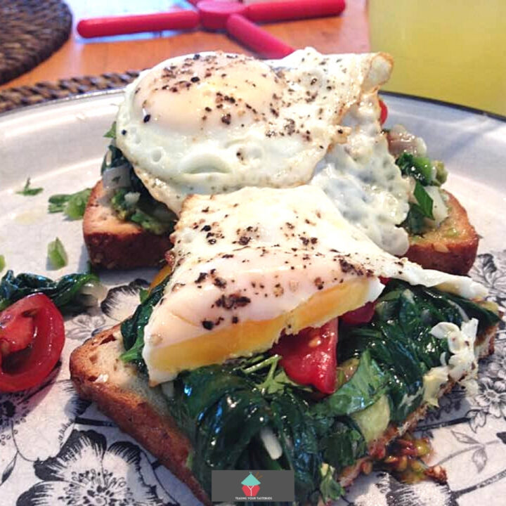 Easy Egg and Avocado Breakfast Easy Egg and Avocado Breakfast. A lovely recipe with layers of poached eggs, seasoned spinach, tomatoes and avocado on hot buttered toast