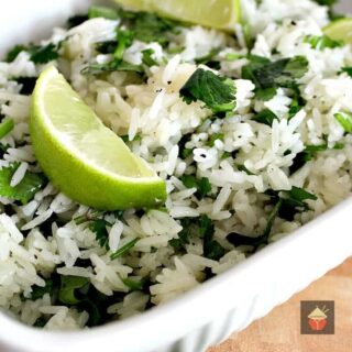 Garlic and Lime Cilantro Rice. A wonderful refreshing side dish using simple fresh ingredients and always popular! | Lovefoodies.com