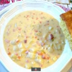 Prize Winning Cheddar and Ham Chowder is a slow cooked, rich, creamy soup made of ham, cheese, and potatoes. Homemade comfort food, ideal for a cold Winter's night. Delicious served with a chunk of cornbread.