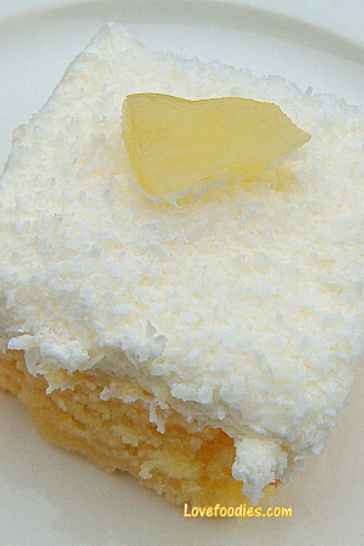 Pineapple and Coconut Poke Cake. A delicious pineapple combined with creamy coconut cake recipe, topped with fresh whipped cream and more coconut, making a soft and fluffy great tasting tropical cake