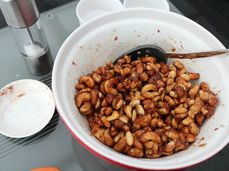 Honey Roasted Nuts, adding sugar and spices Honey Roasted Nuts, adding sugar and spices