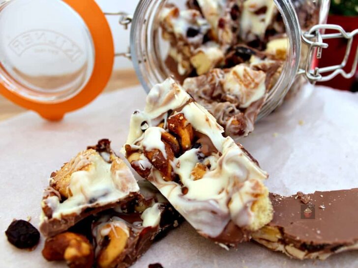 Irish Cream Chocolate Bark 3 Irish Cream Chocolate Bark! A delicious chocolate treat loaded with cranberries, cookies and honey spiced nuts. Perfect for the holidays and great for gifts.
