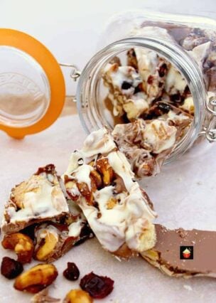 Irish Cream Chocolate Bark Irish Cream Chocolate Bark! A delicious chocolate treat loaded with cranberries, cookies and honey spiced nuts. Perfect for the holidays and great for gifts.
