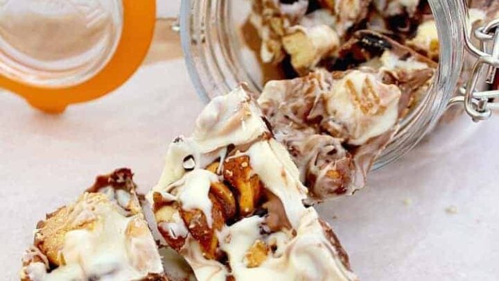 Irish Cream Chocolate Bark 7 Irish Cream Chocolate Bark! A delicious chocolate treat loaded with cranberries, cookies and honey spiced nuts. Perfect for the holidays and great for gifts.